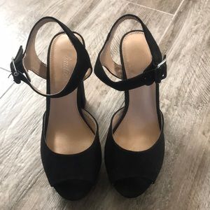 Black platform strapped heels